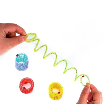 Colorful beaded telephone cord-style spring being stretched between two hands.