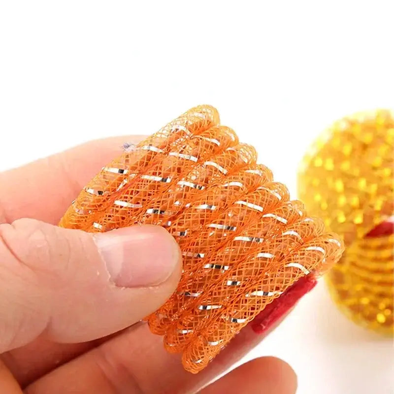 Orange mesh-patterned elastic hair tie with metallic threading.