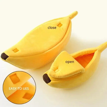 Yellow banana-shaped pencil case with a zipper opening.