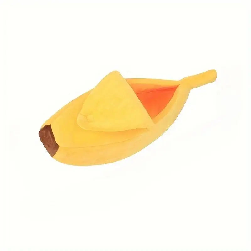 Yellow plastic banana-shaped boat with a paddle.