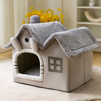 Plush pet house with gray roof and decorative window design.