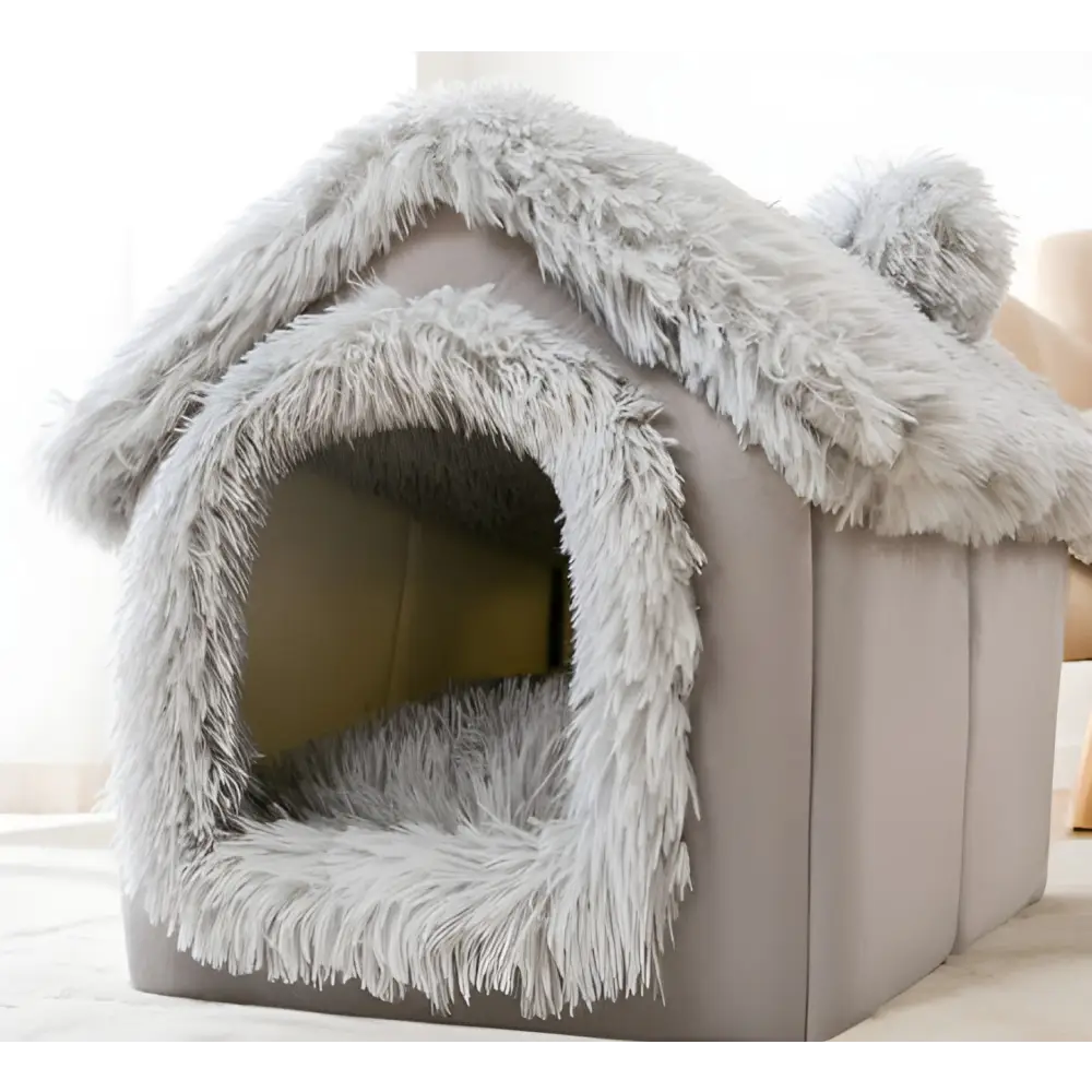 Plush gray pet house with furry trim shaped like a miniature home.