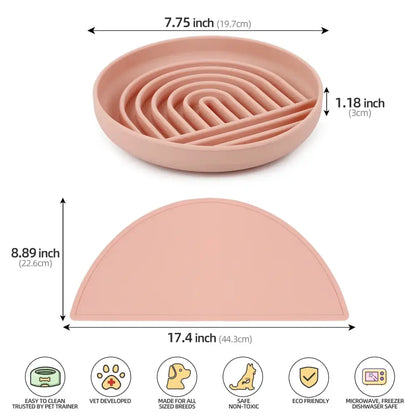 Pink semicircular pet feeding mat with concentric ridges on its surface.