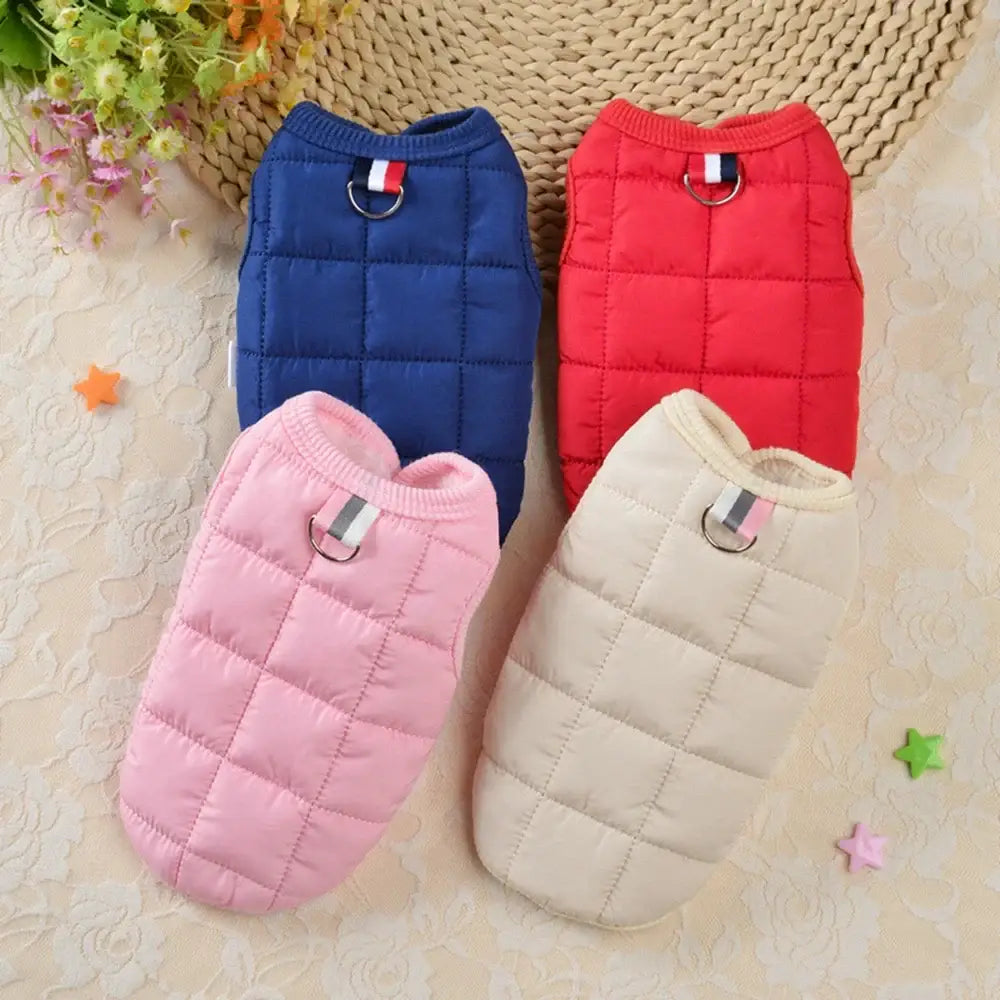 Quilted winter vests in navy blue, red, pink and beige colors.