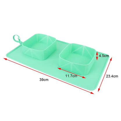 Mint green plastic tray with two compartments and measurement markings.